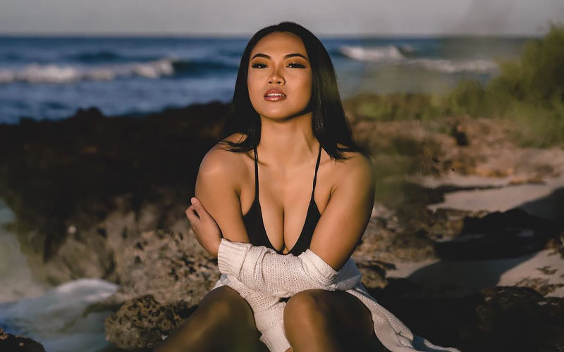 cute kyrgyzstani girl on beach